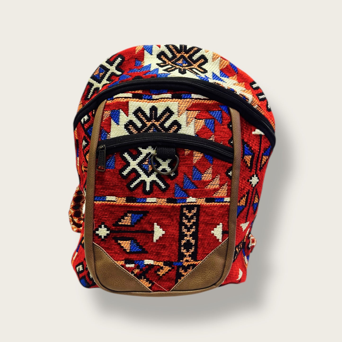 Handwoven Ethnic Backpack – Traditional Patterned Fabric with Leather Details