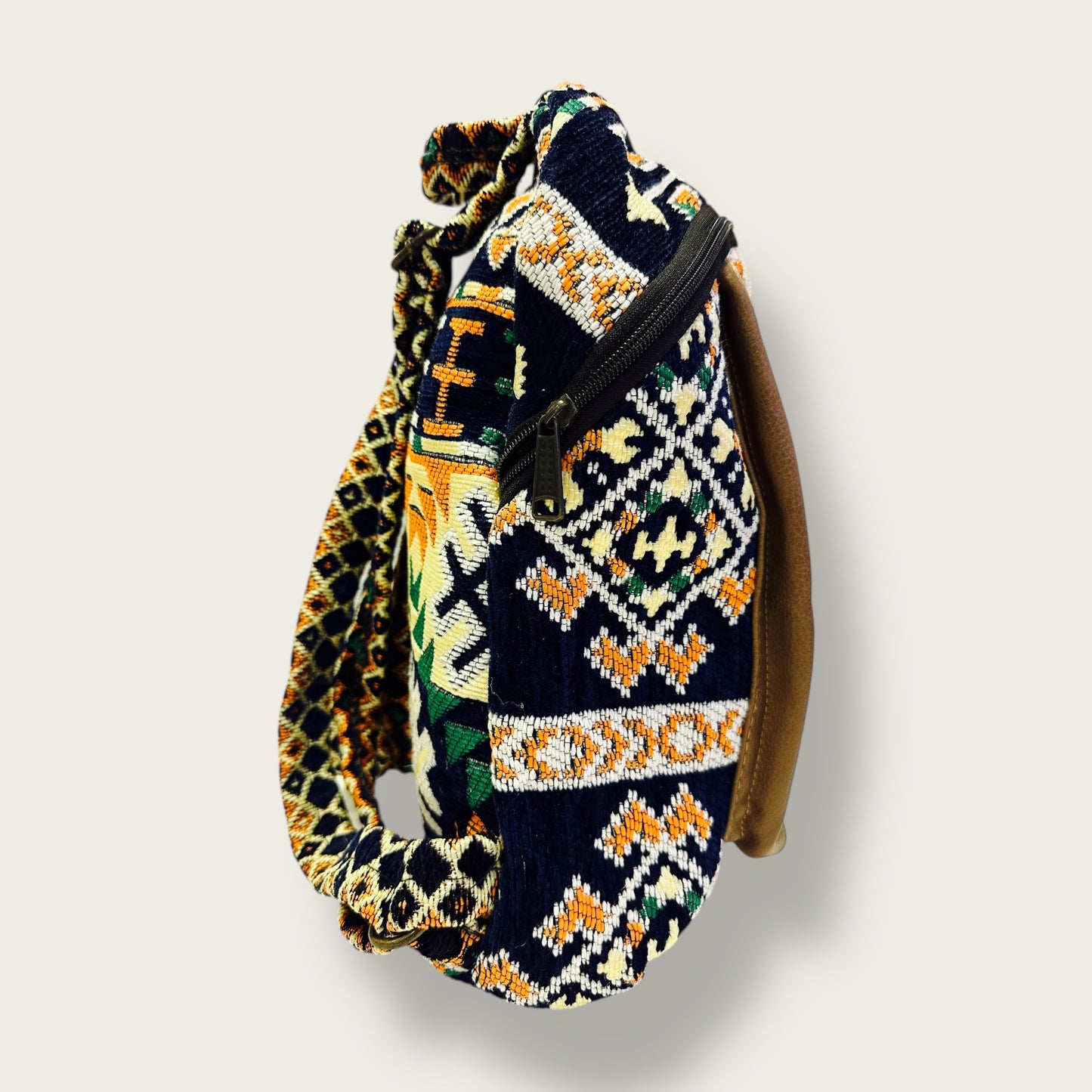 Handwoven Ethnic Backpack – Traditional Patterned Fabric with Leather Details